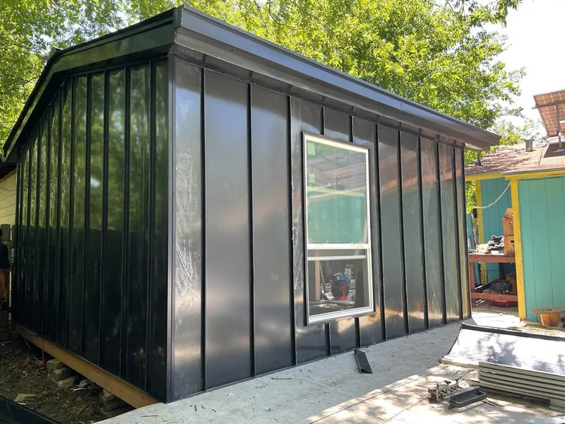 Black standing seam metal wall panels for Roof Inspection in Medical Lake